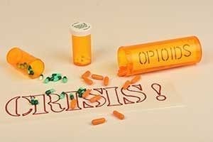 Opioid crisis - bottle of pills spilled
