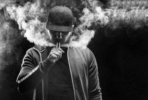 man vaping smoke