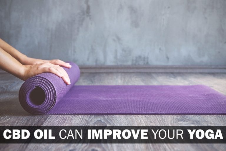 Woman rolling her mat after a yoga class